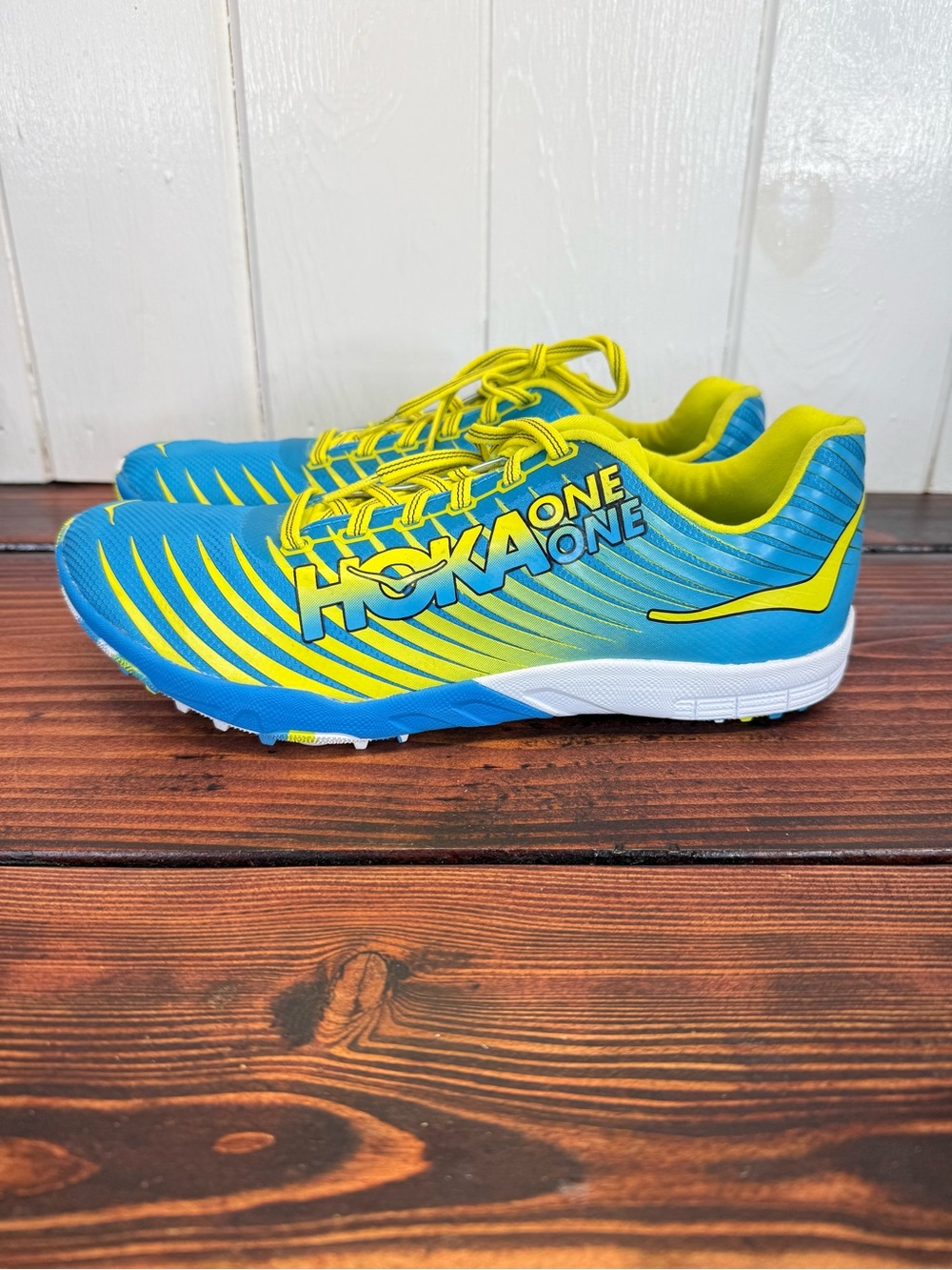 NWOT HOKA One One EVO XC Spike Running Shoes Blue Yellow Women’s 10